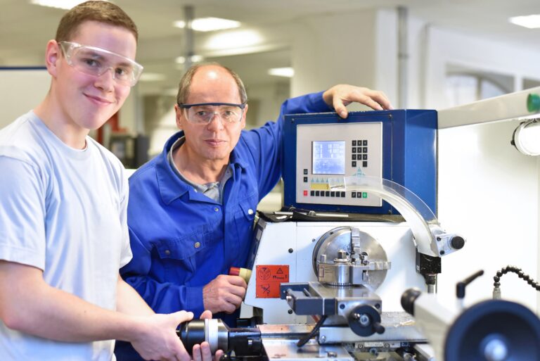 Team mentoring in Precious Plate's ultra-selective electroplating manufacturing facility.